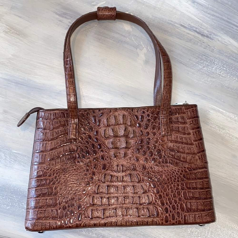 Alligator skin purse.